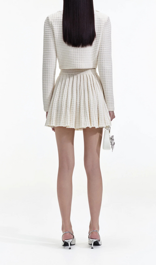 CREAM KNITTED MINI SKIRT