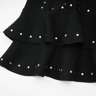 Fabienne black embellished ruffled knitted mini dress