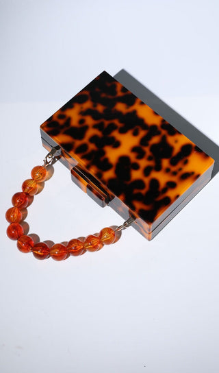 ACRYLIC BEADED CLUTCH IN AMBER Bags Oh CICI 