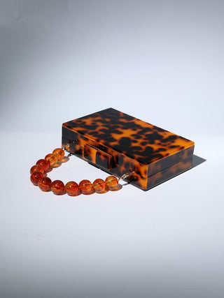 ACRYLIC BEADED CLUTCH IN AMBER Bags Oh CICI 