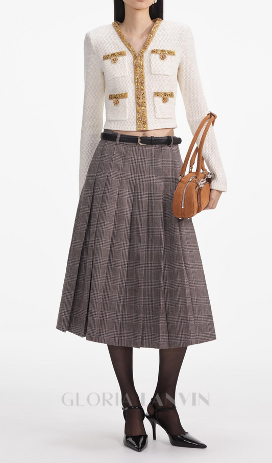 cremefarbene Strickjacke mit Lurex-Beschichtung