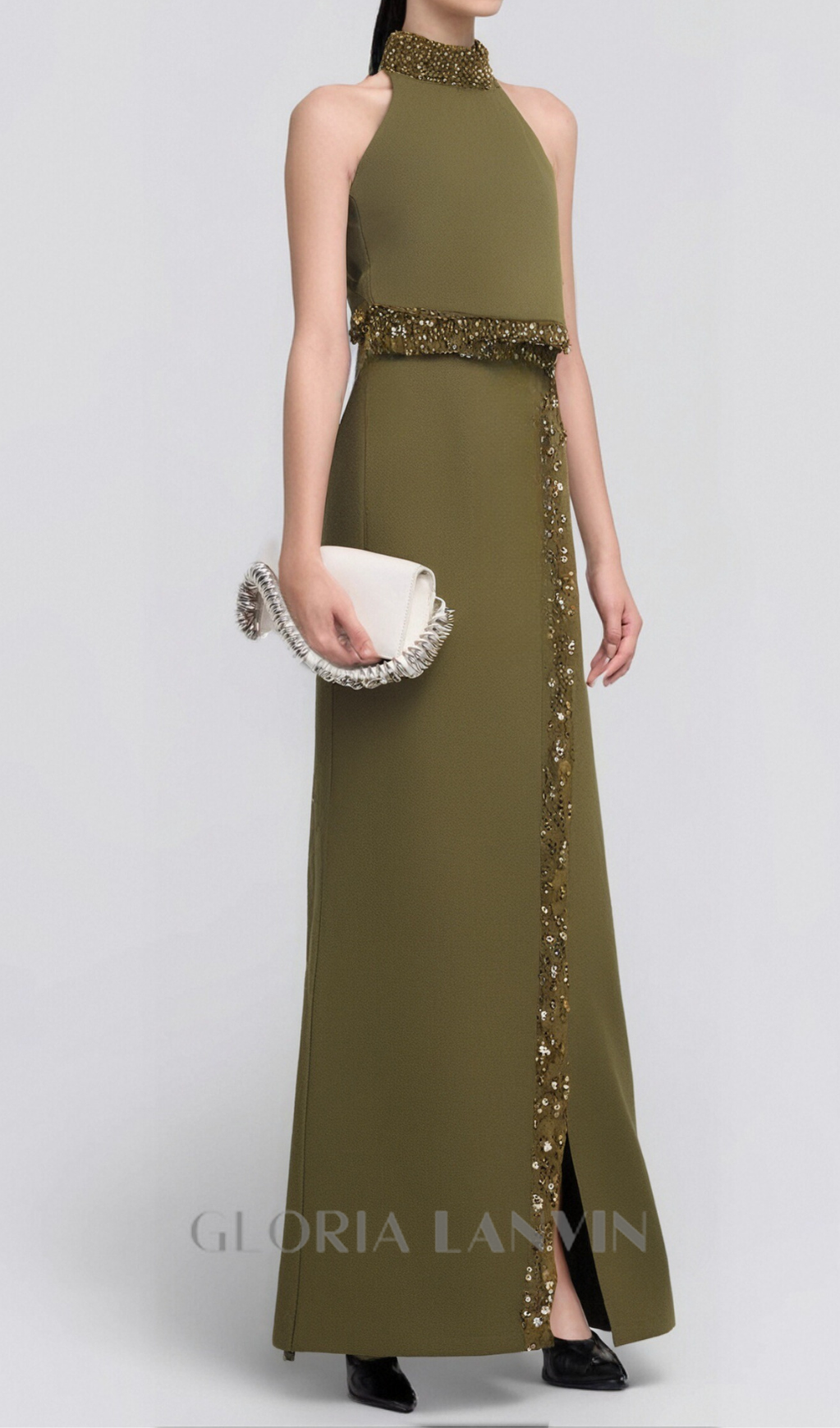 Ensemble jupe fendue et haut dos nu orné de perles et de diamants, de couleur verte