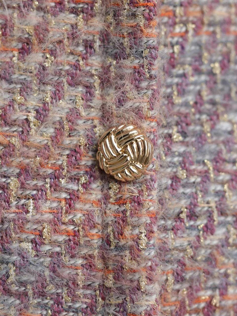 xylia bow v-neck long sleeve mini dress in multicolor